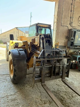 Телескопичен товарач Caterpillar TH62, снимка 1