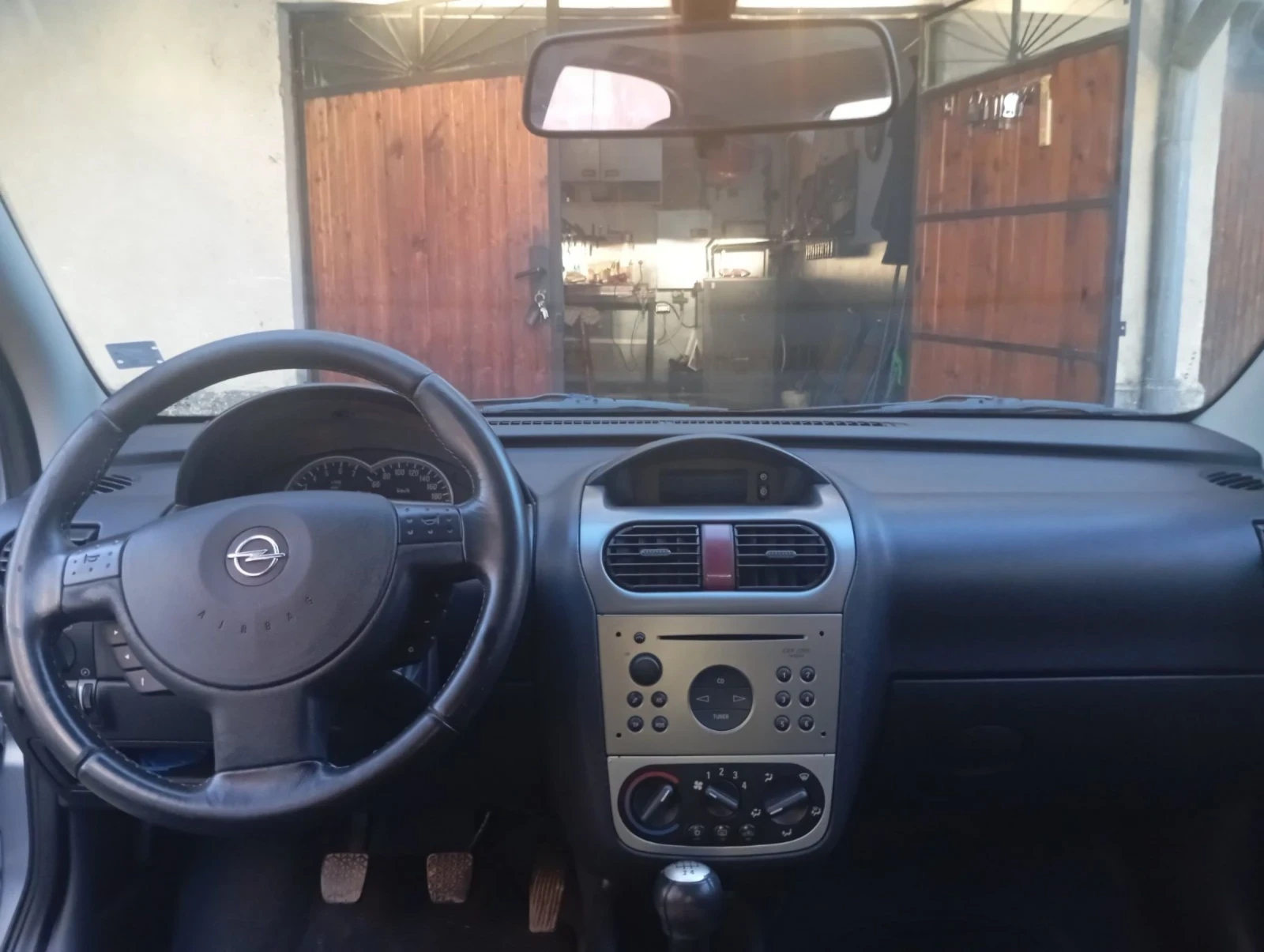 Opel Corsa 1.4 90 к.с - изображение 8