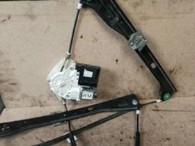 Стъклоповдигач преден ляв  Volkswagen Golf V , снимка 1