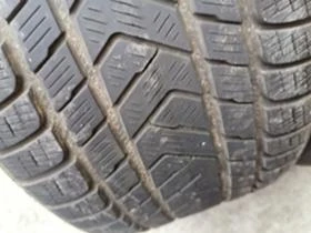 Гуми Зимни 295/35R21, снимка 4