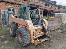 Мини челни товарачи GEHL 7710 - изображение 1