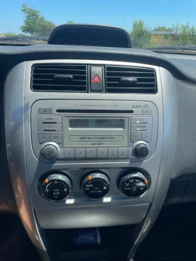 Suzuki Liana 1.6 4x4 gas | Mobile.bg    14