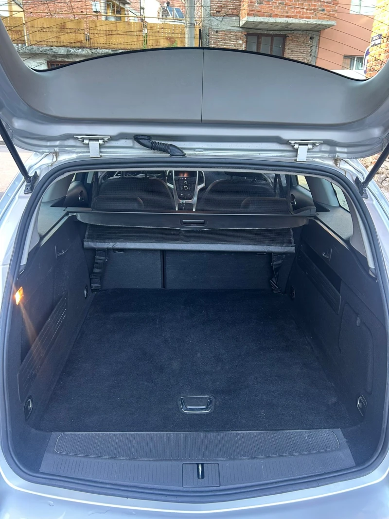 Opel Astra Sport Tourer, снимка 8 - Автомобили и джипове - 52327286