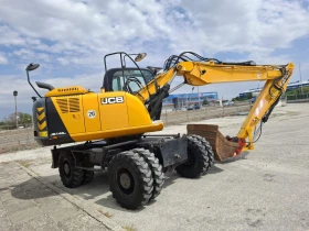      JCB JS 145 W , 3 