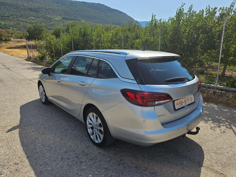 Opel Astra sports tourer, снимка 4 - Автомобили и джипове - 52340104