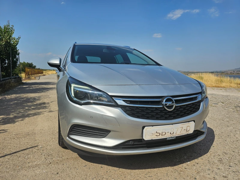 Opel Astra sports tourer, снимка 6 - Автомобили и джипове - 52340104
