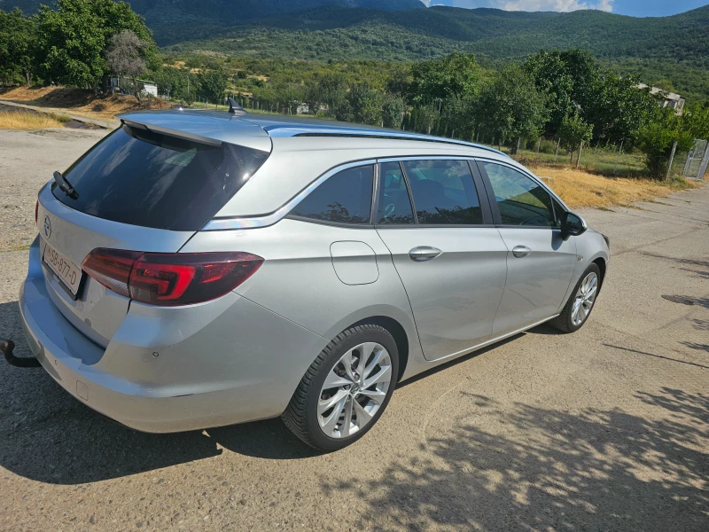 Opel Astra sports tourer, снимка 3 - Автомобили и джипове - 52340104