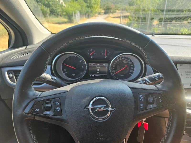 Opel Astra sports tourer, снимка 7 - Автомобили и джипове - 52340104