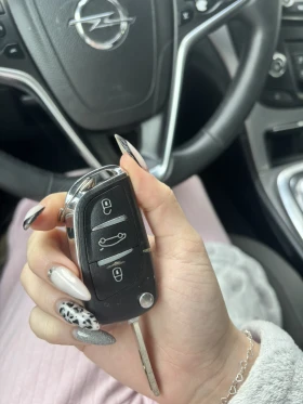 Opel Insignia Sport Tourer 1.6 CDTI, снимка 11