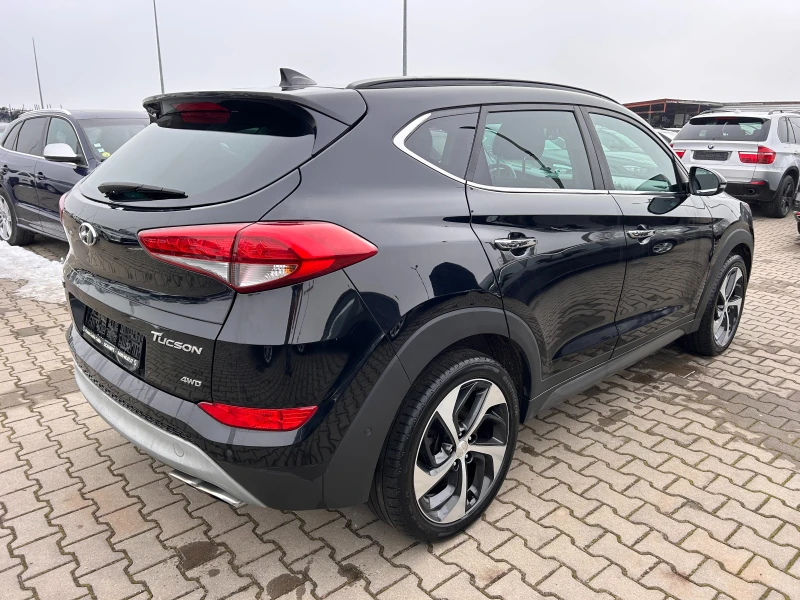 Hyundai Tucson 2.0CRDI 4WD AVTOMAT/NAVI/KOJA/PANORAMA EURO 6, снимка 6 - Автомобили и джипове - 48779872