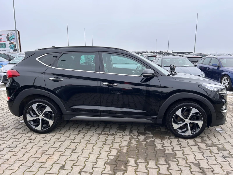 Hyundai Tucson 2.0CRDI 4WD AVTOMAT/NAVI/KOJA/PANORAMA EURO 6, снимка 5 - Автомобили и джипове - 48779872