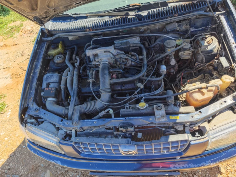 Mazda Demio 1.3, снимка 5 - Автомобили и джипове - 51518173