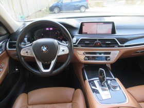 BMW 750 i X-drive 530ps *LASER*Harmon Kardon*Перфектен, снимка 12 - Автомобили и джипове - 42662219