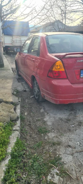 Suzuki Liana - 699 € / 1367.13 лв. - 60069558 3