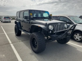 Обява за продажба на Jeep Wrangler Unlimited SAHARA (CARFAX) ~34 500 лв. - изображение 1