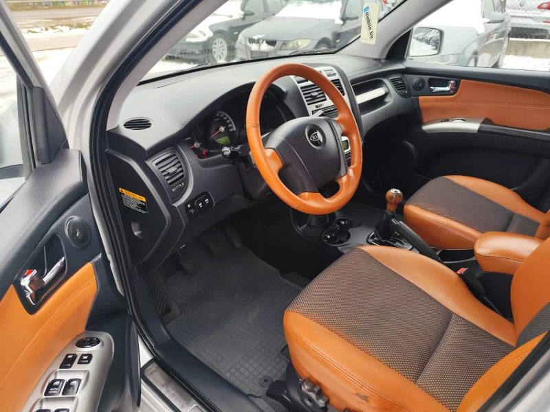 Kia Sportage 2.0 бензин 4х4, снимка 11 - Автомобили и джипове - 53211612
