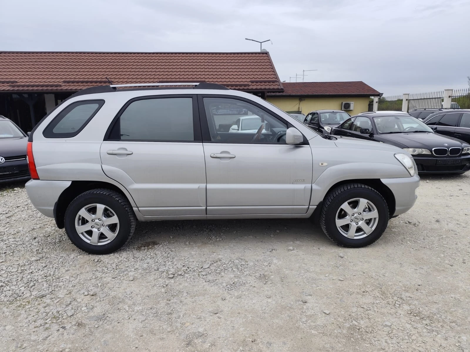 Kia Sportage 2.0 бензин 4х4, снимка 4 - Автомобили и джипове - 53211612