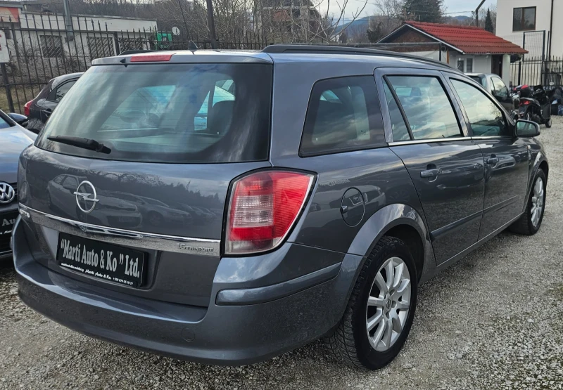 Opel Astra 1.6 Twinport LPG, снимка 10 - Автомобили и джипове - 49317307