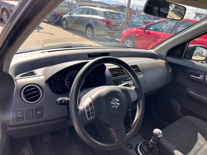 Suzuki Swift 1.3D EURO 4, снимка 10 - Автомобили и джипове - 47498263