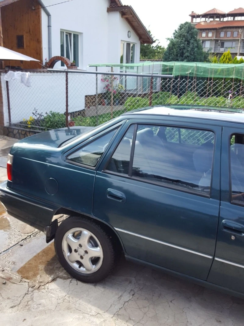 Daewoo Nexia 1.5 16 V, снимка 12 - Автомобили и джипове - 47278864