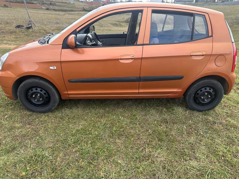 Kia Picanto 1.1 Клима , снимка 4 - Автомобили и джипове - 48106201