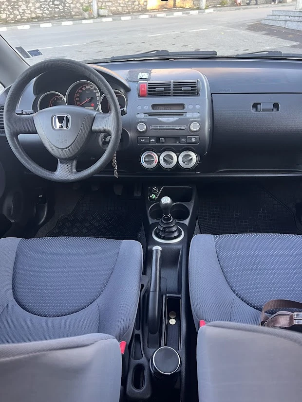 Honda Jazz 1.4I, снимка 16 - Автомобили и джипове - 52793949