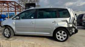 VW Touran VW Touran 1.6 FSI - 10 лв. - 11275627 | Car24.bg