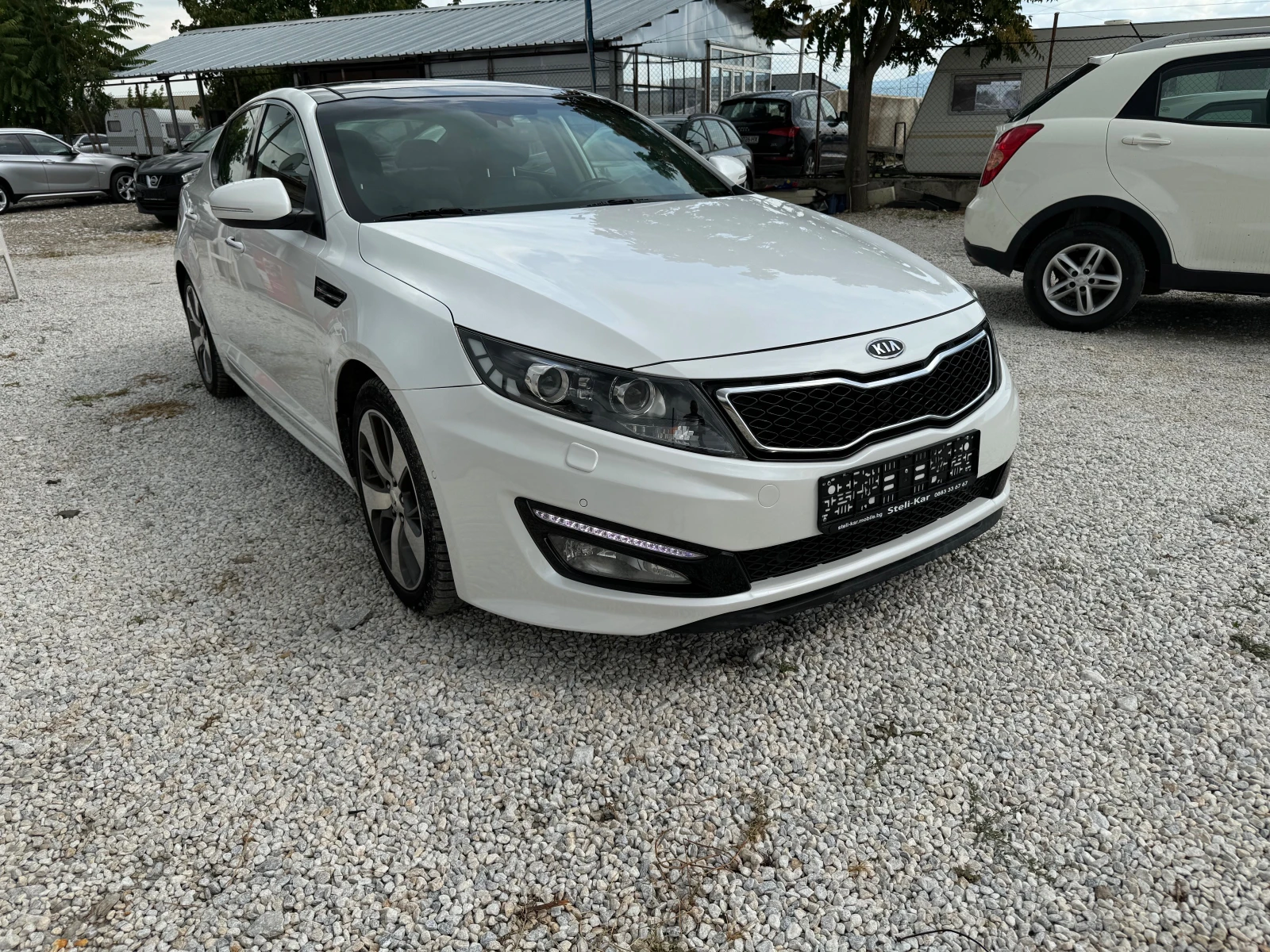 Kia Optima 1.7CRDI-NAVI-KAMERA-XENON-LED-KOJA-OBDUHVANE-PODGR - изображение 7