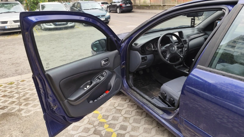 Nissan Almera 1.5 dCi, снимка 5 - Автомобили и джипове - 47492185