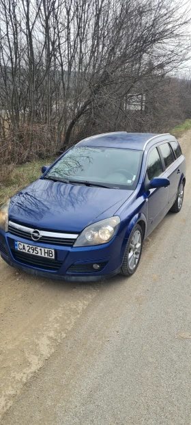 Opel Astra 1.9 CDTI 120к.с., снимка 13