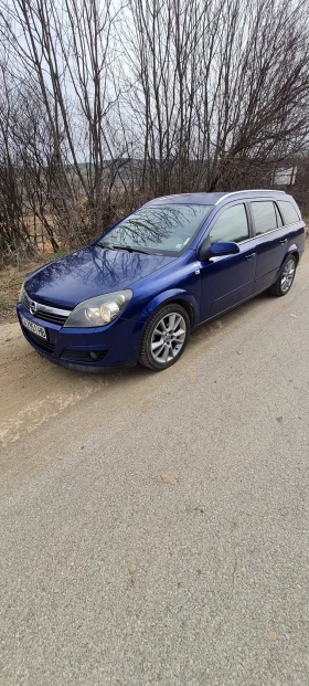 Opel Astra 1.9 CDTI 120к.с., снимка 14