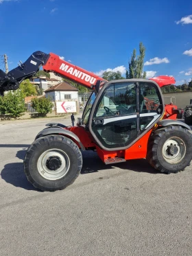 Телескопичен товарач Manitou 731, снимка 1