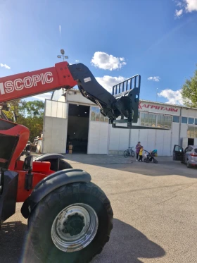 Телескопичен товарач Manitou 731, снимка 13