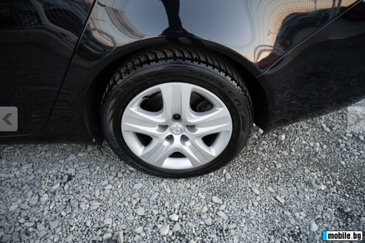 Opel Insignia Sports Tourer, снимка 16 - Автомобили и джипове - 54292208