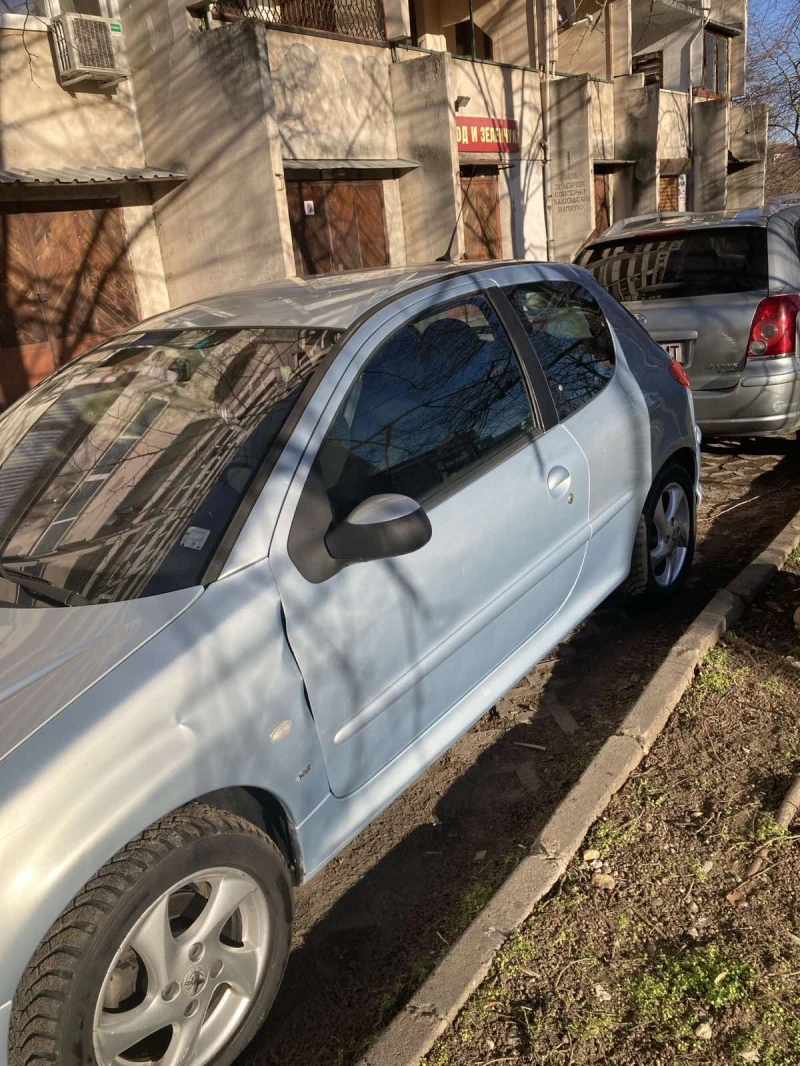 Peugeot 206, снимка 15 - Автомобили и джипове - 48621256