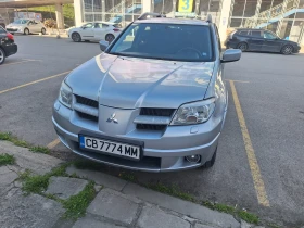 ������ Mitsubishi Outlander