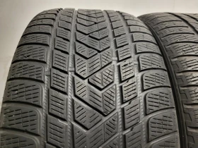 Гуми Зимни 295/40R21, снимка 4 - Гуми и джанти - 47562712