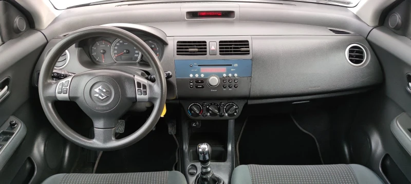 Suzuki Swift 1.3DDIS, снимка 11 - Автомобили и джипове - 48970518