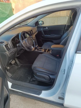 Kia Sportage 1.7 Crdi E6 Automatic  - 11990 € / 23450.40 лв. - 23028795 13
