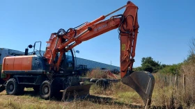Багер Hitachi 210W-3, снимка 10