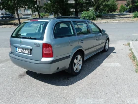 Skoda Octavia 1.6 i, снимка 9
