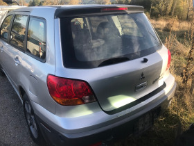 Mitsubishi Outlander 2.4i 2.0 16v 7br avtomat, снимка 2