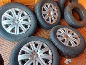 Гуми Зимни 215/65R16, снимка 9