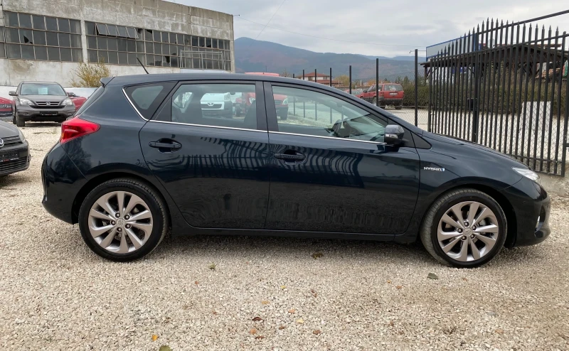 Toyota Auris 1.8 Hybrid/Kamera/Navi/Avtomat/165377 km!, снимка 4 - Автомобили и джипове - 47867735