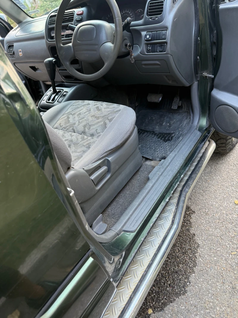 Suzuki Grand vitara 2.0, снимка 8 - Автомобили и джипове - 52429093