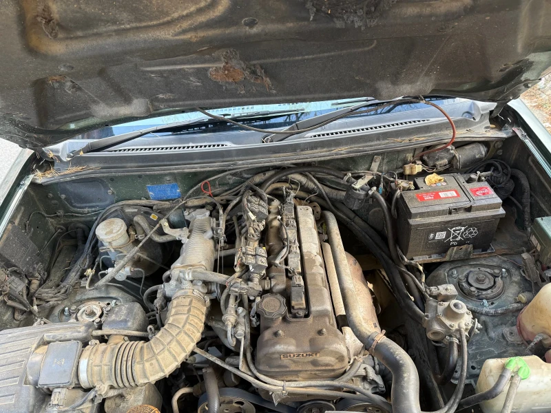 Suzuki Grand vitara 2.0, снимка 10 - Автомобили и джипове - 52429093