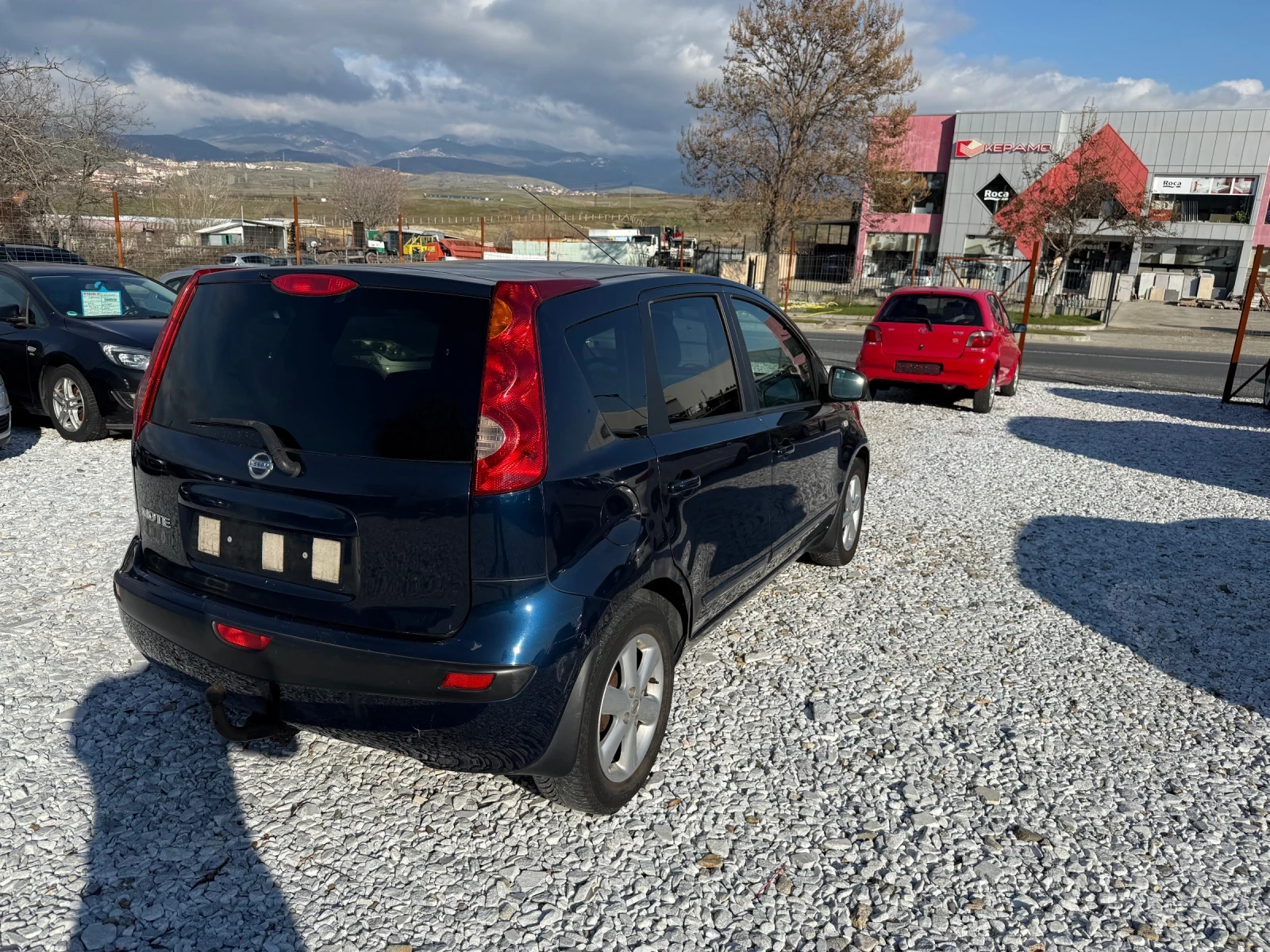 Nissan Note 1.4 90кс - изображение 8