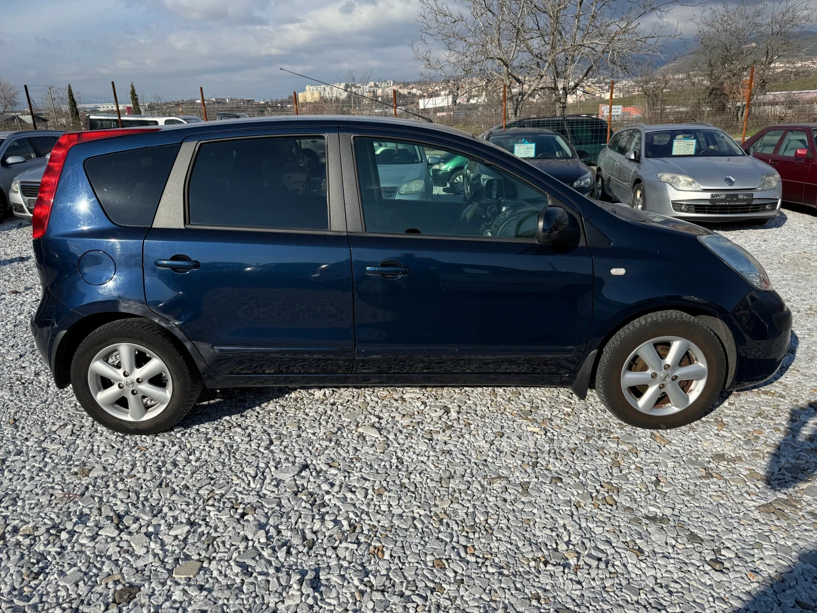 Nissan Note 1.4 90кс - изображение 4