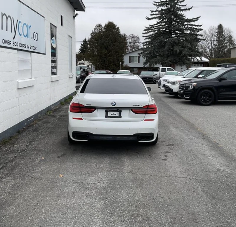 BMW 750 LONG* M-pack* HARMAN/KARDON* ОБДУХ* МОНИТОРИ* PANO, снимка 5 - Автомобили и джипове - 52753108