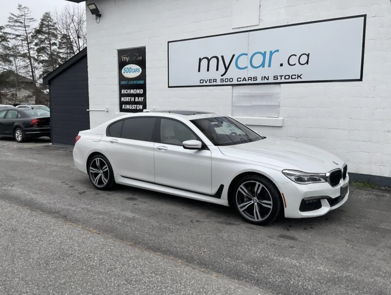 BMW 750 LONG* M-pack* HARMAN/KARDON* ОБДУХ* МОНИТОРИ* PANO, снимка 2 - Автомобили и джипове - 52753108